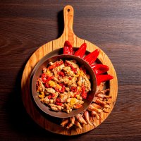 Fajitas de Pollo con pimientos sobre encimera de madera